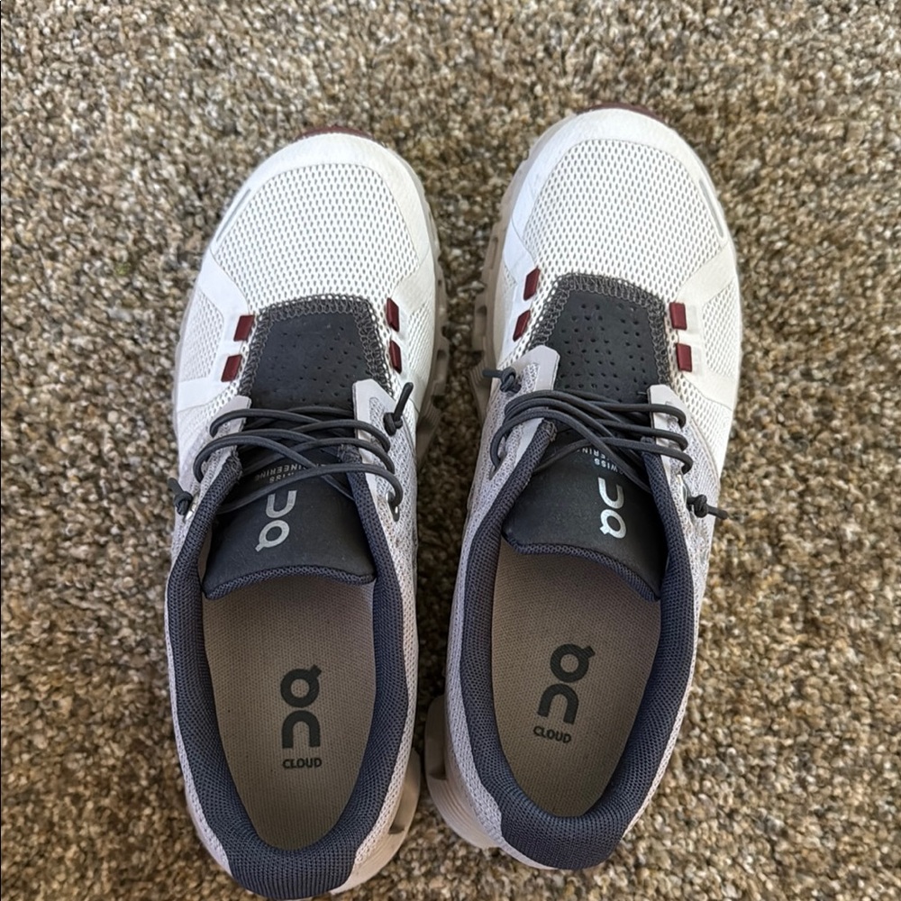 On Running White and Black Sneakers with Cushioned Soles